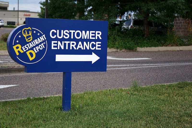 Wing Snob welcoming entrance with branded signage